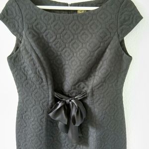 Black jacquard dress with adjustable bow
